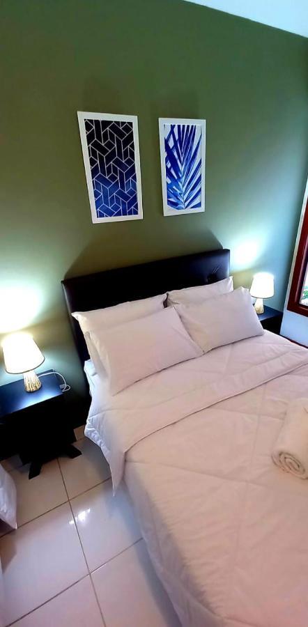 Bliss Hoteis Centro Armacao dos Buzios Luaran gambar A bed with two pillows